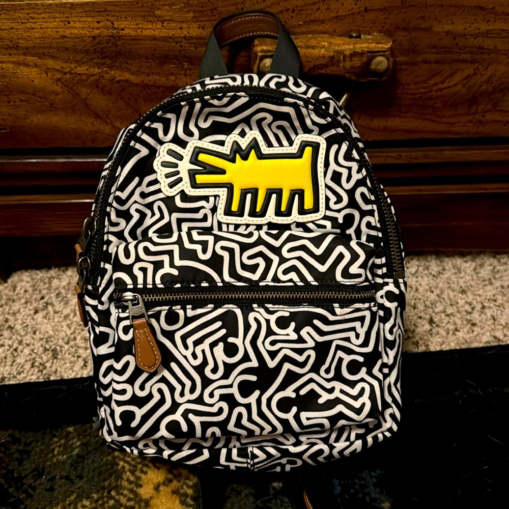 Coach x Keith Haring yellow dog doodle mini backpack